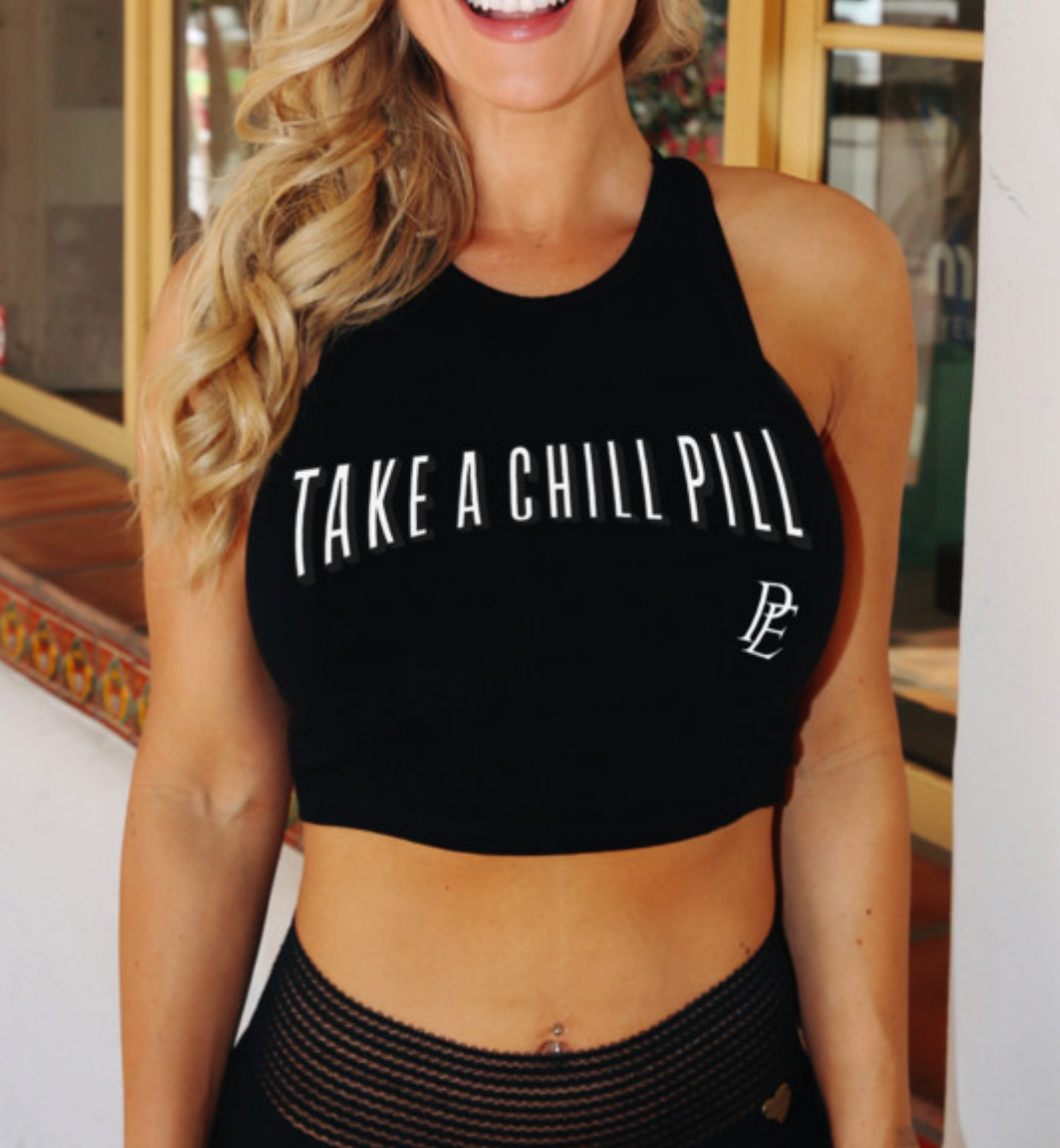 TAKE A CHILL PILL - PREMIUM WOMEN'S FITTED CROP TANK TOP - BLACK